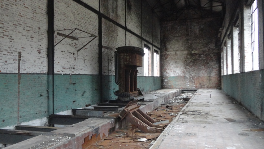 Photo of the inside of an old power house.
